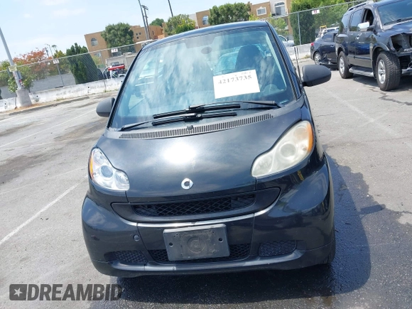 2012 Smart fortwo Pure z VIN WMEEJ3BA1CK556029, wystawiony jako IAAI lot #42173735 z przebiegiem 85 133 mil mil oraz . Historia ofert i sprzedaży dostępna na DreamBid. Obrazek 12.
