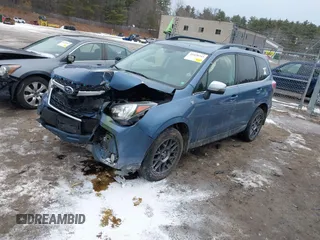 2018 Subaru Forester Touring with VIN JF2SJGWC0JH532501, listed as a IAAI auction lot 41478743 with 98,780 mi miles. Bid and sale history available at carsss.com. Image 17.