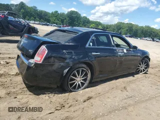 2013 Chrysler 300 C z VIN 2C3CCAKT5DH561771, wystawiony jako Copart lot #56519975 z przebiegiem 67 004 mil mil oraz Czysty tytuł • Clean title. Historia ofert i sprzedaży dostępna na DreamBid. Obrazek 3.