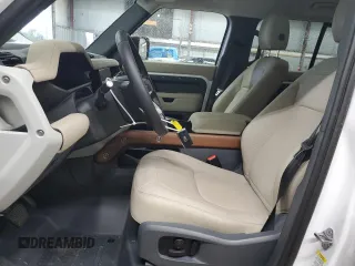2024 Land Rover Defender S with VIN SALEJ7EX4R2283949, listed as a Copart auction lot 83841744 with 9,824 mi miles and Salvage title. Bid and sale history available at DreamBid. Image 7.