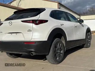 2021 Mazda CX-30 S with VIN 3MVDMAAL8MM226907, listed as a Copart auction lot 53000045 with 29,496 mi miles and Salvage Title. Bid and sale history available at DreamBid. Image 4.