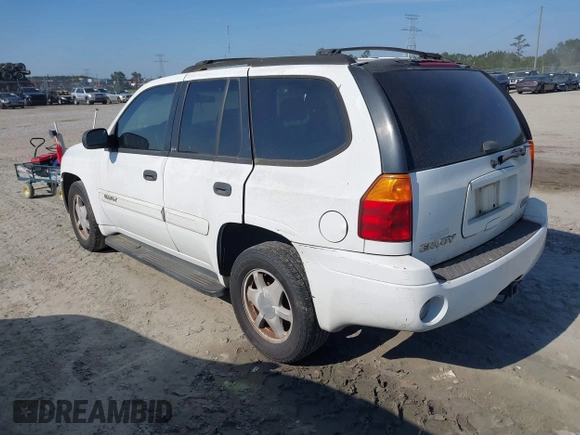 2003 GMC Envoy SLT with VIN 1GKDS13S832300090, listed as a IAAI auction lot 41993627 with 210,631 mi miles. Bid and sale history available at carsss.com. Image 3.