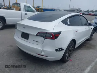 2023 Tesla Model 3 with VIN 5YJ3E1EA2PF417959, listed as a IAAI auction lot 42463853 with 22,736 mi miles and . Bid and sale history available at DreamBid. Image 4.