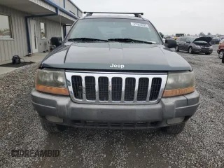 2002 Jeep Grand Cherokee z VIN 1J4GX38S72C152046, wystawiony jako Copart lot #57963095 z przebiegiem 204 576 mil mil oraz Szkoda całkowita • Salvage title. Historia ofert i sprzedaży dostępna na DreamBid. Obrazek 5.