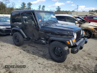 2002 Jeep Wrangler SE with VIN 1J4FA29P82P732805, listed as a Copart auction lot 86017044 with 138,679 mi miles and Salvage Title. Bid and sale history available at DreamBid. Image 4.