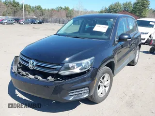 2012 Volkswagen Tiguan SEL with VIN WVGAV7AX4CW524596, listed as a IAAI auction lot 42042966 with 100,986 mi miles and . Bid and sale history available at DreamBid. Image 2.