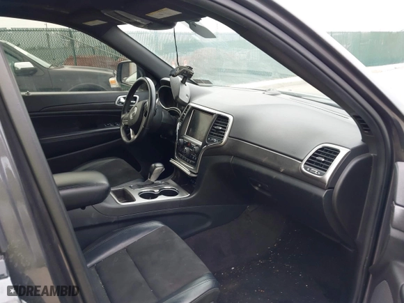 2018 Jeep Grand Cherokee Laredo E with VIN 1C4RJFAG4JC464783, listed as a IAAI auction lot 41664453 with 106,466 mi miles. Bid and sale history available at carsss.com. Image 5.
