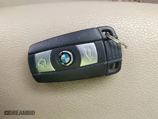 2014 BMW X1 sDrive28i with VIN WBAVM1C54EVW46561, listed as a IAAI auction lot 41880387 with 125,096 mi miles. Bid and sale history available at carsss.com. Image 11.