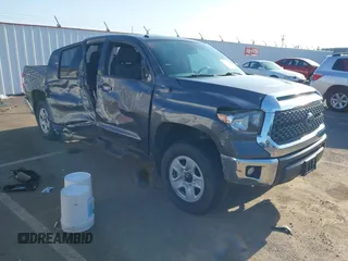 2018 Toyota Tundra SR z VIN 5TFUY5F13JX742618, wystawiony jako IAAI lot #42097756 z przebiegiem 57 186 mil mil oraz . Historia ofert i sprzedaży dostępna na DreamBid. Obrazek 1.