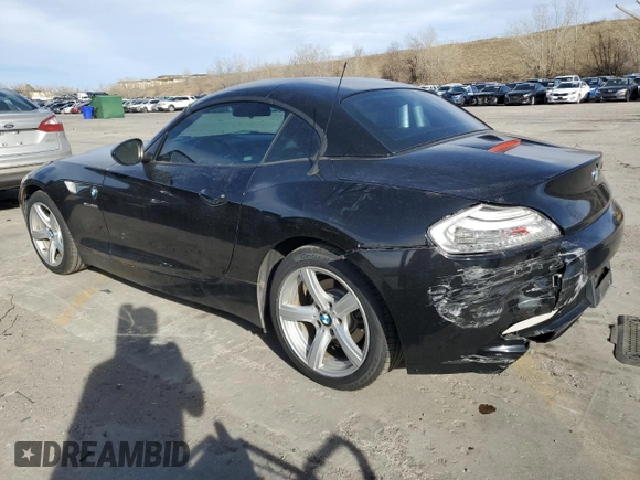 2013 BMW Z4 sDrive28i with VIN WBALL5C50DJ103778, listed as a Copart auction lot 49452215 with 104,203 mi miles and Salvage Title. Bid and sale history available at carsss.com. Image 2.