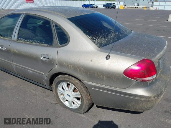 2005 Ford Taurus SEL z VIN 1FAFP56S35A312249, wystawiony jako IAAI lot #42293829 z przebiegiem 433 549 mil mil oraz . Historia ofert i sprzedaży dostępna na DreamBid. Obrazek 6.