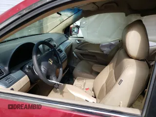 2006 Honda Odyssey EX z VIN 5FNRL38436B058444, wystawiony jako Copart lot #70381084 z przebiegiem 181 928 mil mil oraz Szkoda całkowita • Salvage title. Historia ofert i sprzedaży dostępna na DreamBid. Obrazek 7.