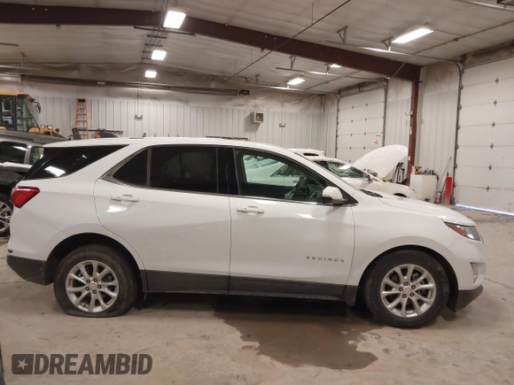 2018 Chevrolet Equinox LT z VIN 2GNAXSEV7J6138909, wystawiony jako IAAI lot #41295974 z przebiegiem 68 852 mil mil oraz . Historia ofert i sprzedaży dostępna na DreamBid. Obrazek 13.