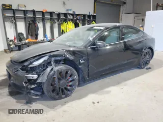 2022 Tesla Model 3 Performance with VIN 5YJ3E1EC7NF104209, listed as a Copart auction lot 86266344 with 77,335 mi miles and Salvage Title. Bid and sale history available at DreamBid. Image 1.