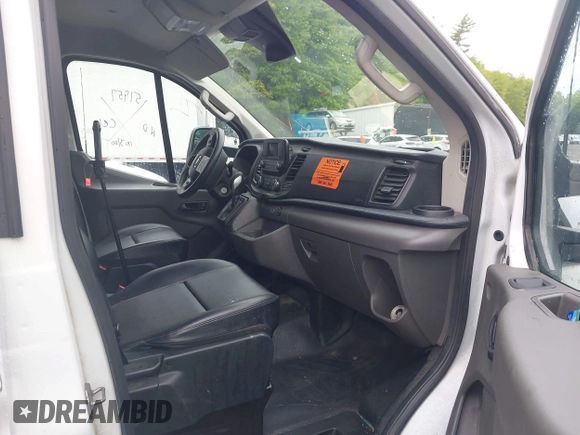 2021 Ford Transit Cargo with VIN 1FTBR1Y87MKA76372, listed as a IAAI auction lot 42251675 with 98,072 mi miles and . Bid and sale history available at DreamBid. Image 5.