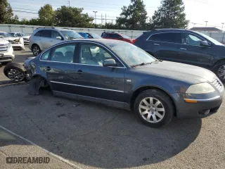 2002 Volkswagen Passat GLS with VIN WVWPD63B12P240042, listed as a Copart auction lot 77996234 with 156,852 mi miles and Salvage Title. Bid and sale history available at carsss.com. Image 4.
