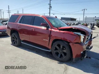 2019 GMC Yukon SLE with VIN 1GKS1AKC9KR355643, listed as a Copart auction lot 52050855 with 50,729 mi miles and Salvage Title. Bid and sale history available at carsss.com. Image 4.
