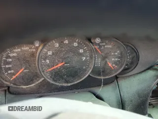 1999 Porsche 911 z VIN WP0AA2998XS620298, wystawiony jako Copart lot #59540745 z przebiegiem Nie podano mil oraz Szkoda całkowita • Salvage title. Historia ofert i sprzedaży dostępna na DreamBid. Obrazek 9.