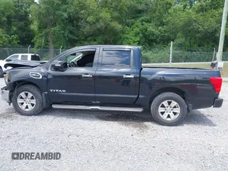 2017 Nissan Titan SV with VIN 1N6AA1E58HN542504, listed as a IAAI auction lot 42564921 with 161,555 mi miles and . Bid and sale history available at DreamBid. Image 14.