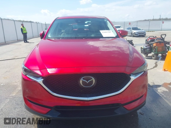 2018 Mazda CX-5 Grand Touring with VIN JM3KFBDM6J0424663, listed as a IAAI auction lot 42003207 with 95,442 mi miles and . Bid and sale history available at DreamBid. Image 12.