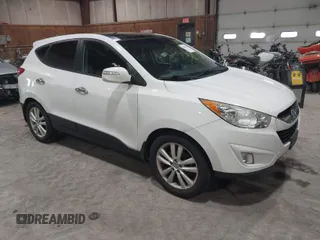 2013 Hyundai Tucson GLS with VIN KM8JU3AC2DU568134, listed as a IAAI auction lot 41887176 with 166,710 mi miles. Bid and sale history available at carsss.com. Image 1.