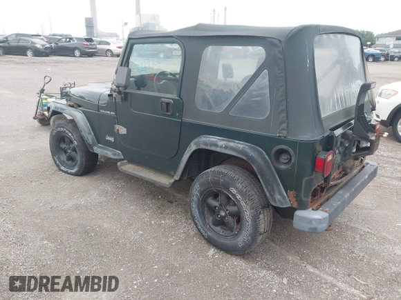 1999 Jeep Wrangler SE z VIN 1J4FY29P7XP479351, wystawiony jako IAAI lot #42797020 z przebiegiem 171 598 mil mil oraz . Historia ofert i sprzedaży dostępna na DreamBid. Obrazek 3.