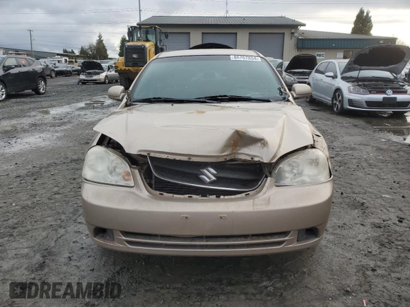 2007 Suzuki Forenza z VIN KL5JD56Z07K657218, wystawiony jako Copart lot #86767854 z przebiegiem 93 044 mil mil oraz Szkoda całkowita • Salvage title. Historia ofert i sprzedaży dostępna na DreamBid. Obrazek 5.