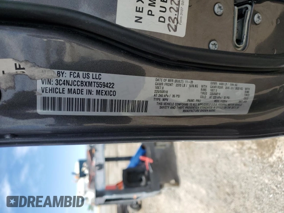 2021 Jeep Compass Limited with VIN 3C4NJCCBXMT559422, listed as a Copart auction lot 56952545 with 135,697 mi miles and Salvage title. Bid and sale history available at DreamBid. Image 14.