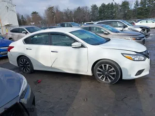 2018 Nissan Altima 2.5 SV with VIN 1N4AL3AP5JC170904, listed as a IAAI auction lot 41621502 with 115,674 mi miles. Bid and sale history available at carsss.com. Image 13.