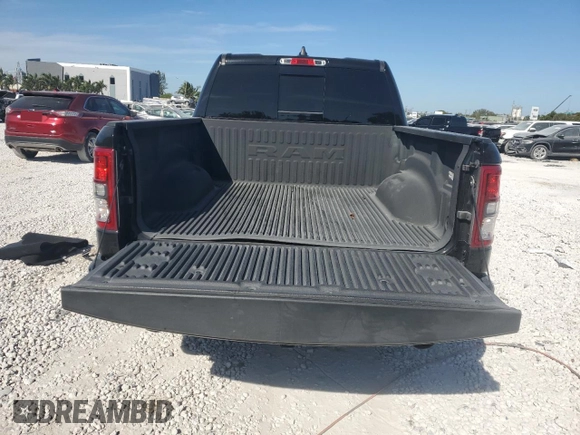 2021 Ram 1500 Lone Star with VIN 1C6RREFT2MN660620, listed as a Copart auction lot 49831035 with 49,276 mi miles and Salvage title. Bid and sale history available at DreamBid. Image 6.