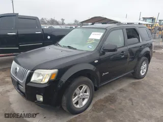 2009 Mercury Mariner Hybrid with VIN 4M2CU29319KJ02879, listed as a IAAI auction lot 41561942 with 135,488 mi miles. Bid and sale history available at carsss.com. Image 2.
