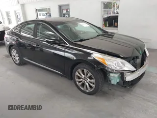 2014 Hyundai Azera Limited z VIN KMHFH4JG0EA362302, wystawiony jako IAAI lot #42422140 z przebiegiem 120 303 mil mil oraz . Historia ofert i sprzedaży dostępna na DreamBid. Obrazek 1.