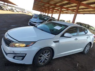 2014 Kia Optima EX z VIN 5XXGN4A74EG294124, wystawiony jako IAAI lot #41413272 z przebiegiem 154 058 mil mil oraz . Historia ofert i sprzedaży dostępna na DreamBid. Obrazek 14.