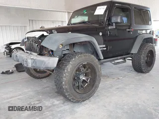 2018 Jeep Wrangler Sport S with VIN 1C4GJWAG3JL927925, listed as a IAAI auction lot 42387748 with 48,447 mi miles and . Bid and sale history available at DreamBid. Image 2.