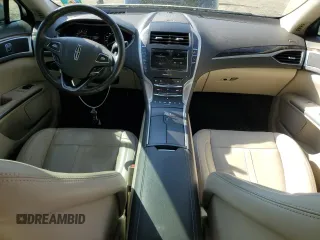 2016 Lincoln MKZ z VIN 3LN6L2JK1GR626675, wystawiony jako Copart lot #56068645 z przebiegiem 94 068 mil mil oraz Szkoda całkowita • Salvage title. Historia ofert i sprzedaży dostępna na DreamBid. Obrazek 8.