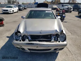 1999 Mercedes-Benz CLK-Class with VIN WDBLJ65G9XF065356, listed as a Copart auction lot 73586424 with 228,410 mi miles and Salvage Title. Bid and sale history available at carsss.com. Image 5.