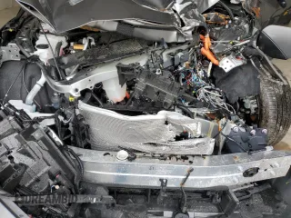 2024 Toyota bZ4X XLE with VIN JTMAAAAA1RA046054, listed as a Copart auction lot 53476515 with Not Provided miles and Salvage Title. Bid and sale history available at DreamBid. Image 12.