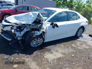 2019 Toyota Camry LE with VIN 4T1B11HK2KU187475, listed as a IAAI auction lot 42192293 with 44,413 mi miles and . Bid and sale history available at DreamBid. Image 2.
