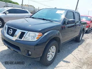 2017 Nissan Frontier Pro-4X with VIN 1N6DD0EV2HN754569, listed as a IAAI auction lot 42404558 with 87,367 mi miles and . Bid and sale history available at DreamBid. Image 2.