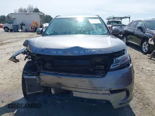 2020 Land Rover Range Rover Velar S z VIN SALYB2EX7LA259607, wystawiony jako IAAI lot #40980294 z przebiegiem 95 967 mil mil oraz . Historia ofert i sprzedaży dostępna na DreamBid. Obrazek 12.
