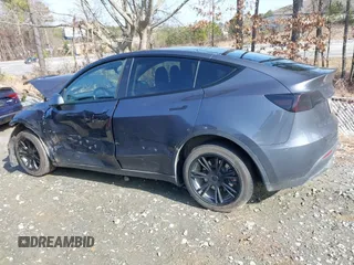 2023 Tesla Model Y Long Range with VIN 7SAYGDEE1PA053215, listed as a IAAI auction lot 41476973 with 58,025 mi miles and . Bid and sale history available at DreamBid. Image 13.