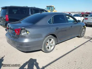 2015 Volkswagen Passat 1.8T S with VIN 1VWAS7A38FC116213, listed as a IAAI auction lot 41749385 with 169,599 mi miles. Bid and sale history available at carsss.com. Image 4.