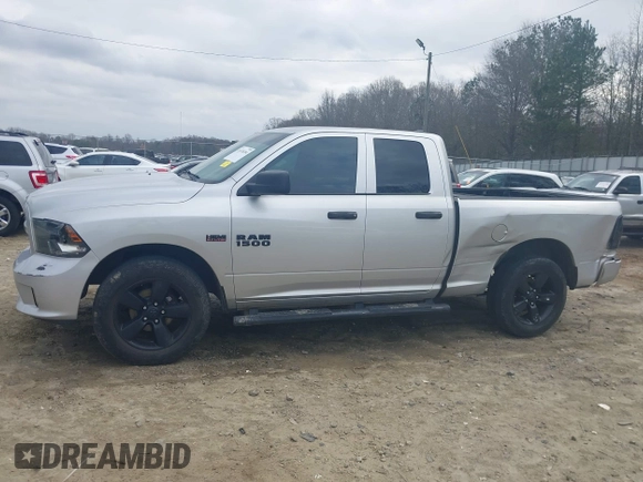 2018 Ram 1500 Tradesman z VIN 1C6RR7FT7JS204931, wystawiony jako IAAI lot #41520204 z przebiegiem 157 398 mil mil oraz . Historia ofert i sprzedaży dostępna na DreamBid. Obrazek 6.