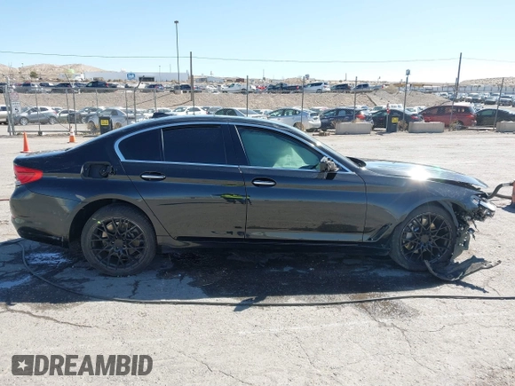 2018 BMW 5 Series 540i with VIN WBAJE5C52JWA97999, listed as a IAAI auction lot 41763708 with Not Provided miles and . Bid and sale history available at carsss.com. Image 13.