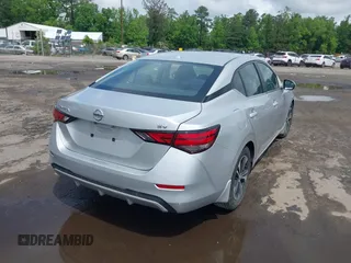 2021 Nissan Sentra SV z VIN 3N1AB8CV5MY299245, wystawiony jako IAAI lot #42180004 z przebiegiem 25 856 mil mil oraz . Historia ofert i sprzedaży dostępna na DreamBid. Obrazek 4.