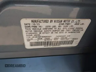 2014 Infiniti Q50 Premium with VIN JN1BV7AP3EM680901, listed as a IAAI auction lot 42143210 with 205,625 mi miles and . Bid and sale history available at carsss.com. Image 9.