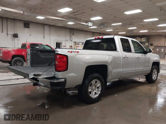 2015 Chevrolet Silverado 1500 LT with VIN 1GCVKREH5FZ271451, listed as a IAAI auction lot 42040083 with 262,135 mi miles and . Bid and sale history available at DreamBid. Image 4.