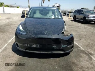 2022 Tesla Model Y Performance with VIN 7SAYGDEF4NF436834, listed as a Copart auction lot 68992234 with 22,171 mi miles and Salvage title. Bid and sale history available at DreamBid. Image 11.