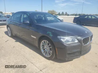 2014 BMW 7 Series 740Li with VIN WBAYE4C59ED138376, listed as a Copart auction lot 76878354 with 73,129 mi miles and Salvage Title. Bid and sale history available at carsss.com. Image 4.