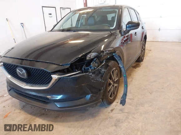 2018 Mazda CX-5 Touring with VIN JM3KFBCM9J0437490, listed as a IAAI auction lot 42006998 with 176,959 mi miles. Bid and sale history available at carsss.com. Image 6.